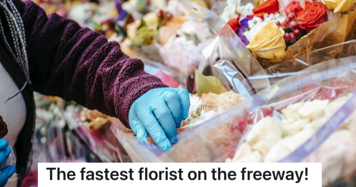 Push lawn mower sitting in wet grass with clumps on the wheels
