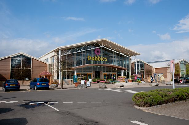 An image of the storefront of a Dobbies garden centre 