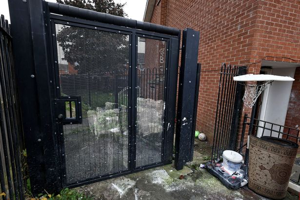 The alleygate is locked, however, the fencing around Kathleen's house and derelict land to the rear is not secure, allowing access into the alley
