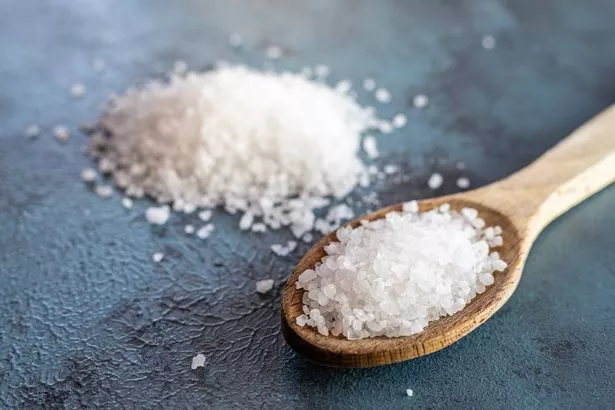 Natural salt and wooden spoon