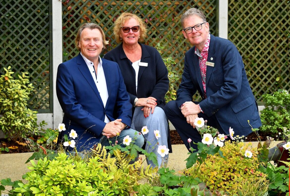 TV gardener David Domoney opens the newly transformed Centred Garden at Acorns Children's Hospice, Walsall. He is pictured with Linda Petrons, Director of Fundraising and Communications, and Chairman Boyd Douglas-Davies, both from Greenfingers Charity.
