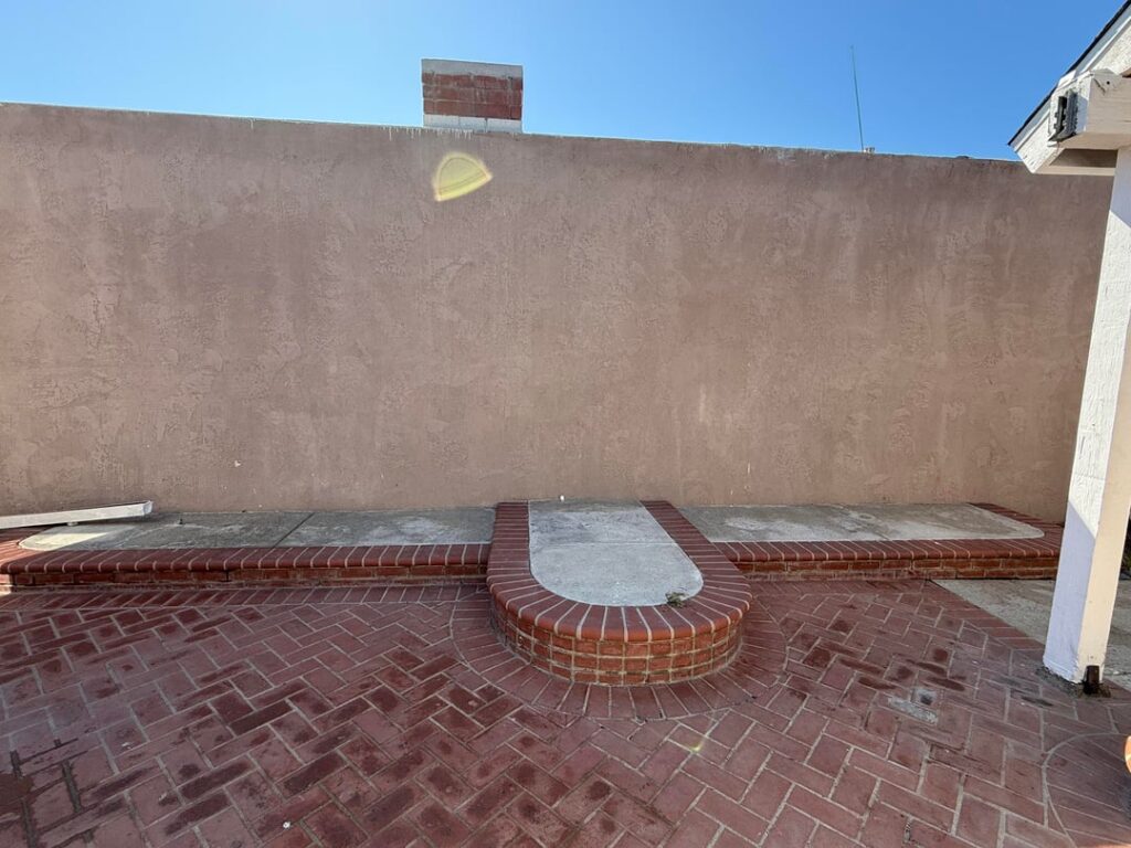 Previous owner put cement in the planter . What should I do with this space ?