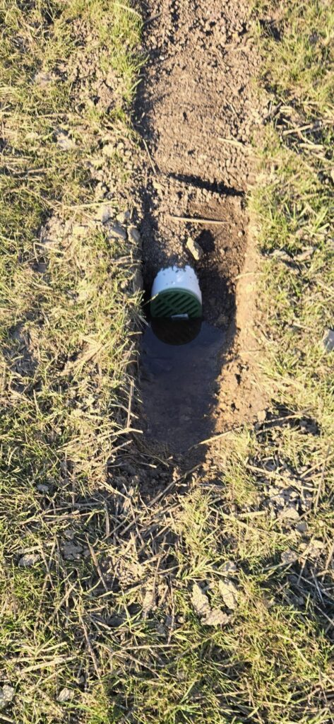 Got a buried downspout done but water is pooling at the end. Should landscaper mitigate this?