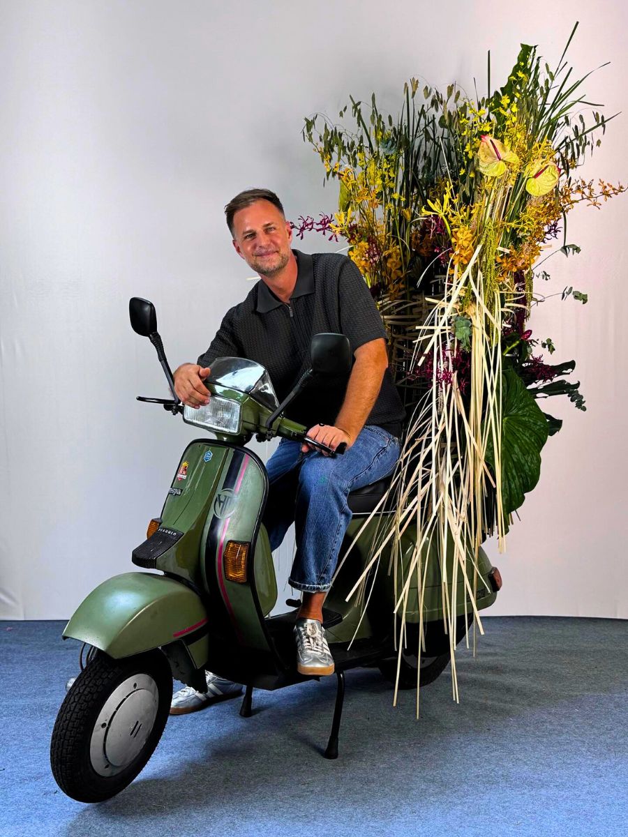 Attila Németh in Vietnam With a Vintage Motor Bike With Flowers