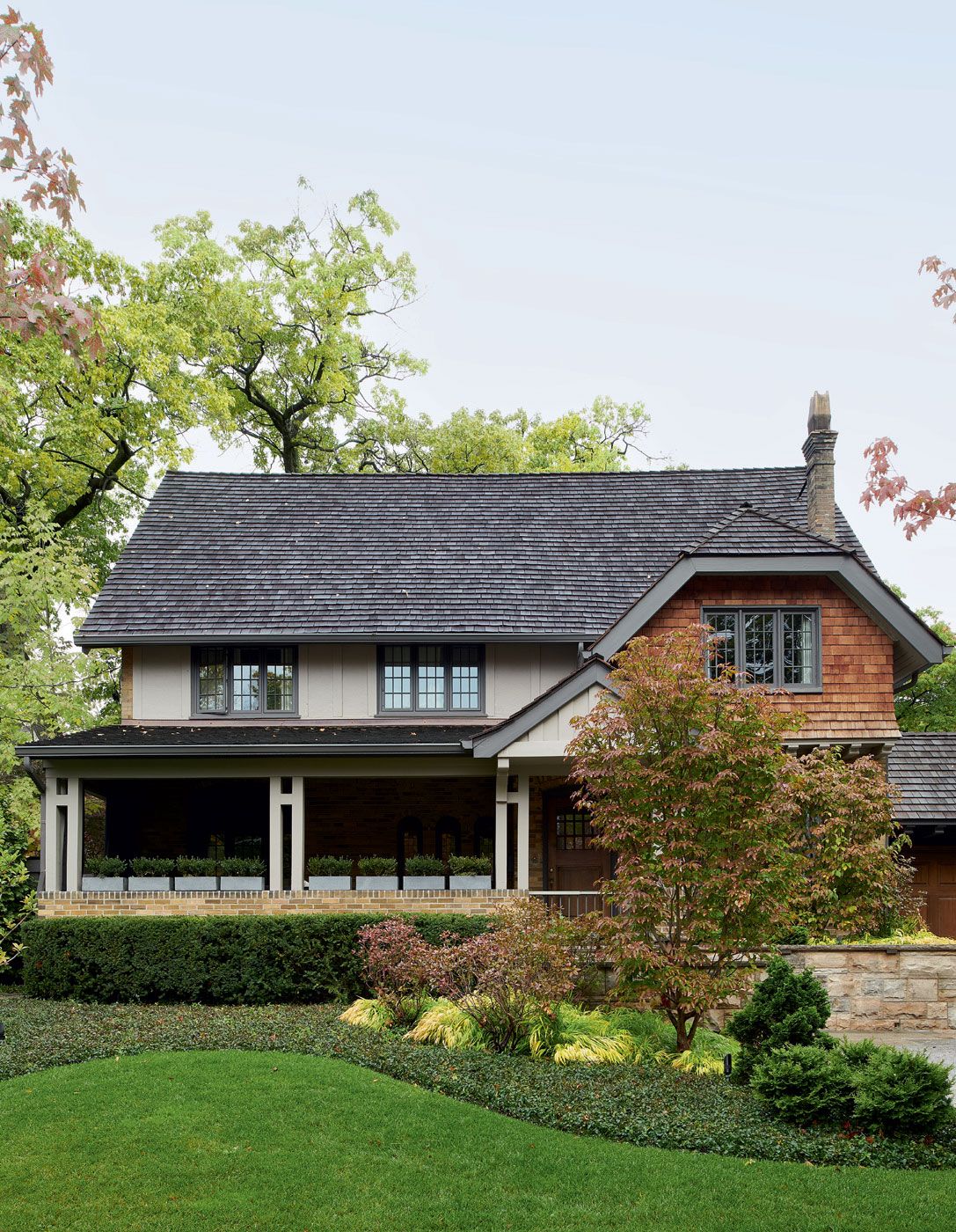 Image may contain Cottage House Building Housing Plant Grass and Roof