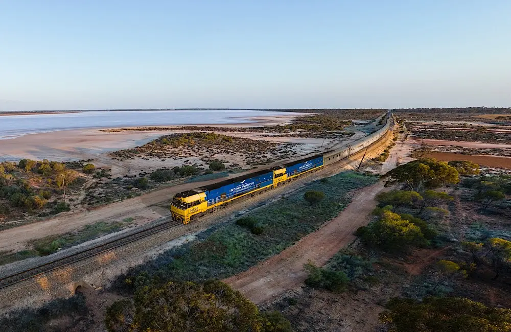 The Indian Pacific passing Lake Julia – another iconic Journey Beyond rail experience.