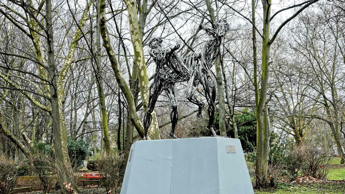 statue in wooded area