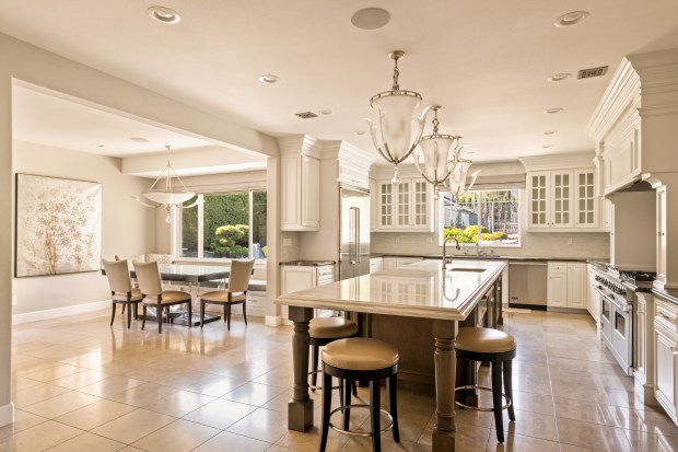 The gourmet kitchen and breakfast nook. (Photo by Engel Studios)
