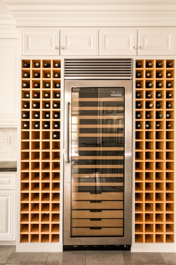 The wine fridge and storage. (Photo by Engel Studios)