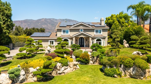 This Claremont estate, boasting a meticulously-crafted Asian-inspired garden, is on...
