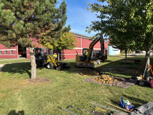 Painesville Township Service Department employees dig a rain garden at...
