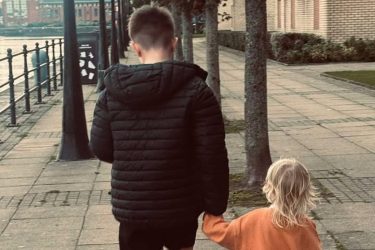 Harry on one of his walks accompanied by his younger sister
