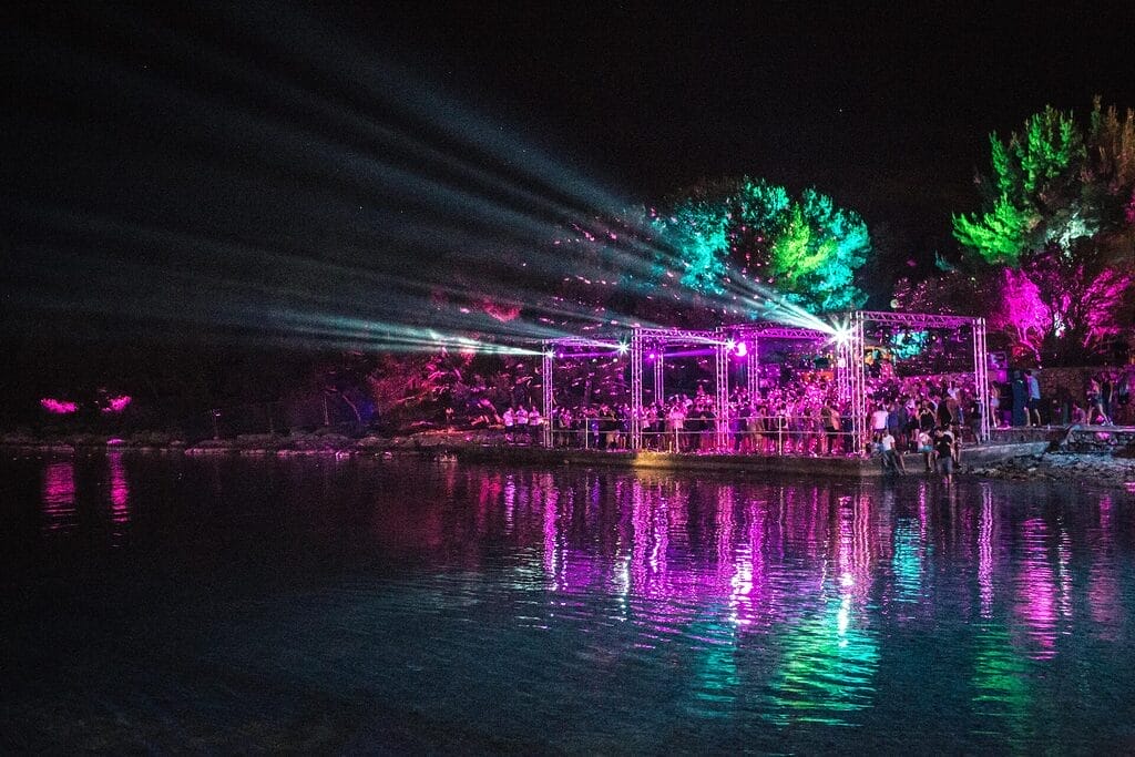 image 2 Stage with lights over lake