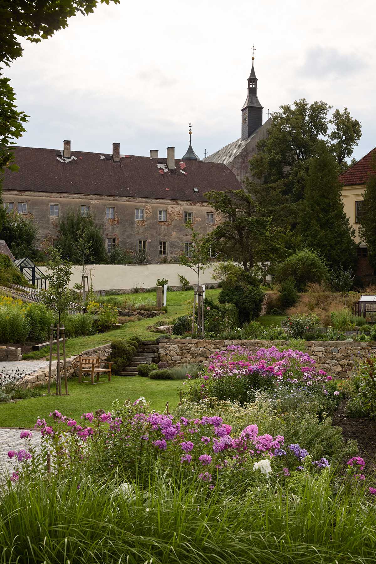 matěj šebek architekti transforms Kraffer Garden into a contemporary community space 