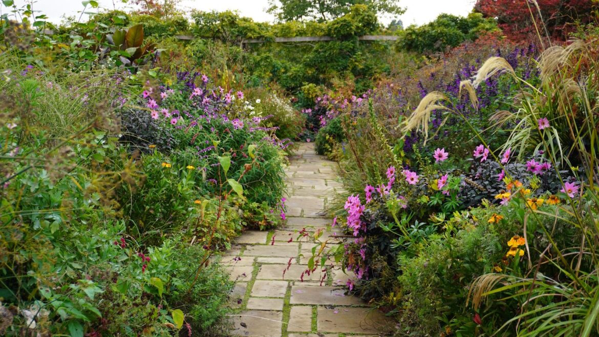 Beyond Wild Expectations: Inside Gravetye Manor, Sussex, UK Gravetye Manor Flower Garden in Autumn