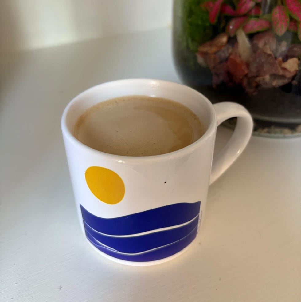 will kirk's mug featuring a sun and waves