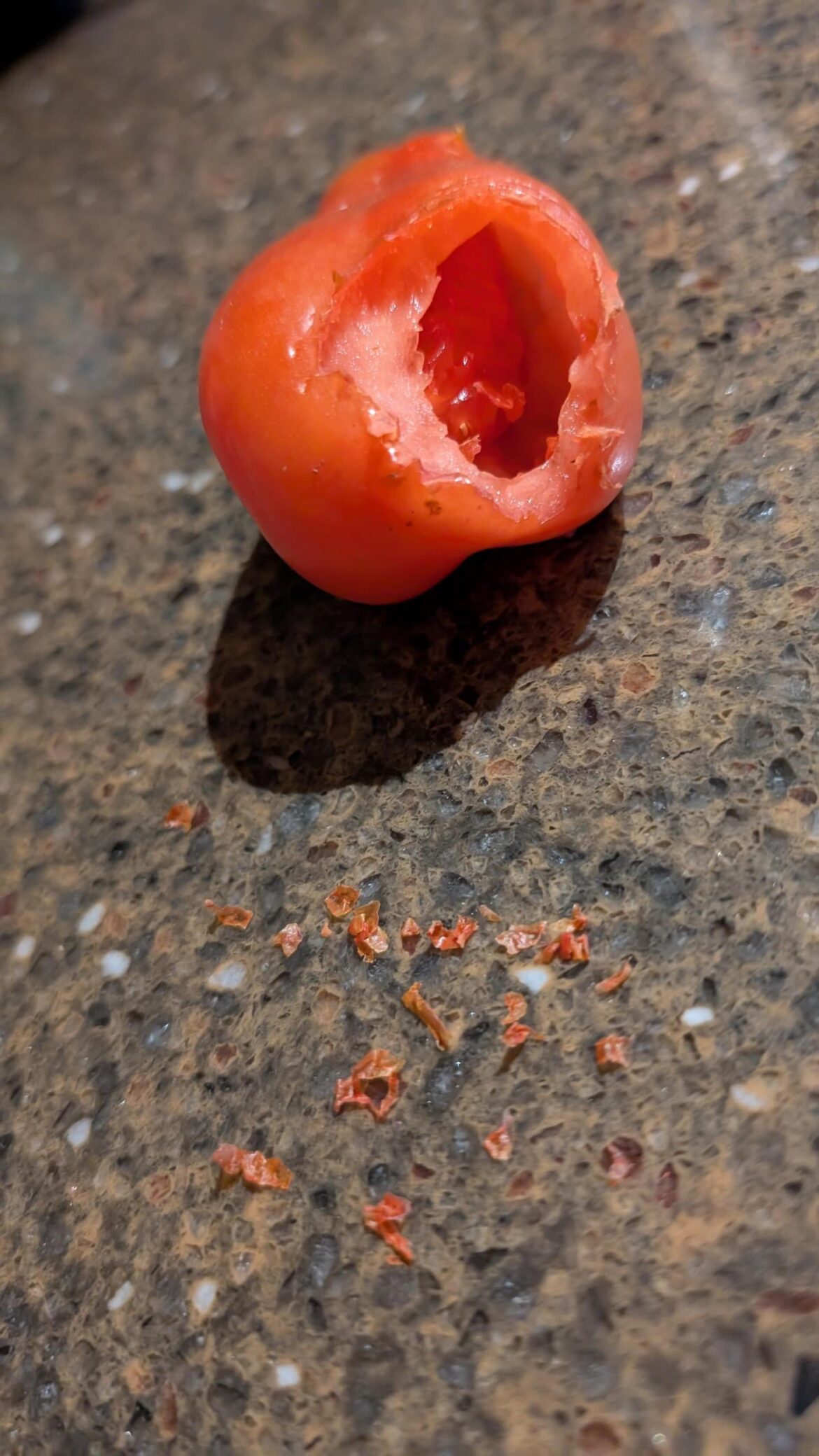 Help needed with understanding what’s happening to this tomato Help needed with understanding what's happening to this tomato