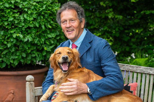 Gardening expert Monty Don with a dog