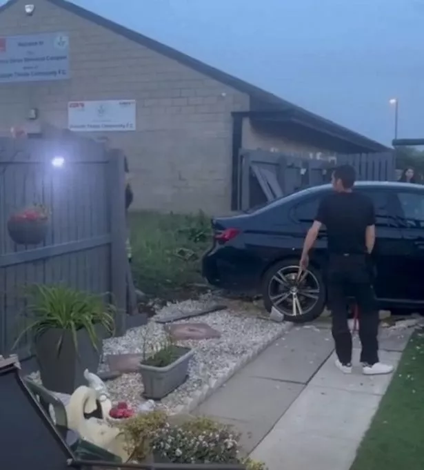 The scene after Naismith ploughed through the garden fence