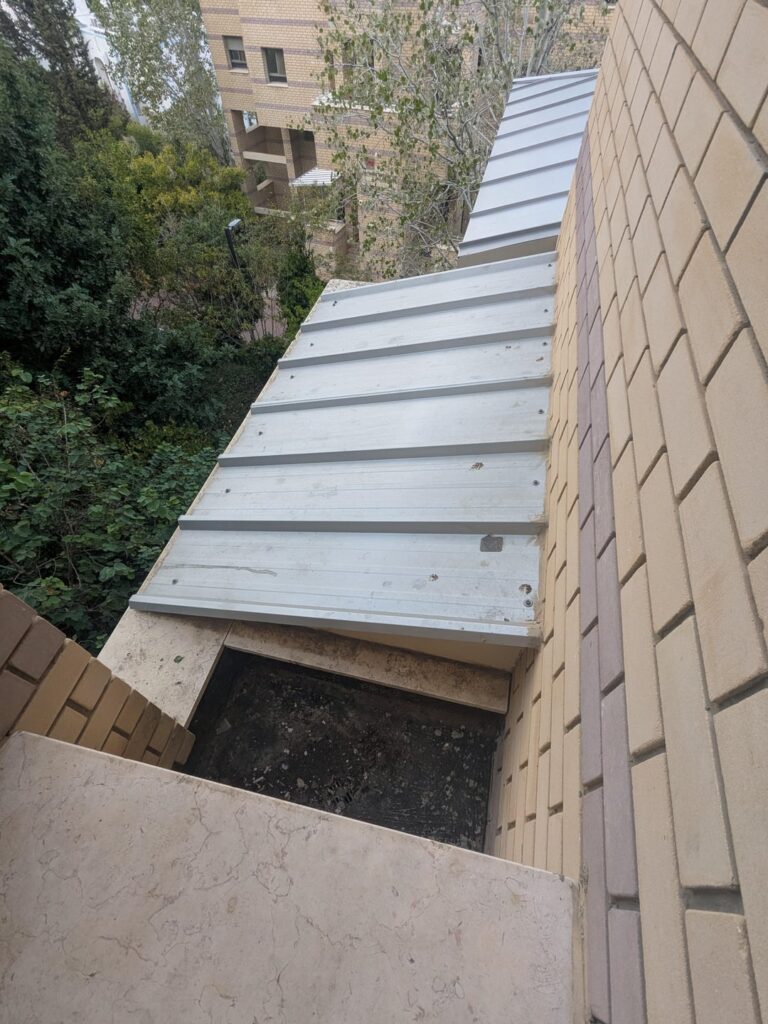 Got this secret little square of nothing in my dorm room, thinking of putting dirt in it and growing something. Give me your best/craziest ideas.