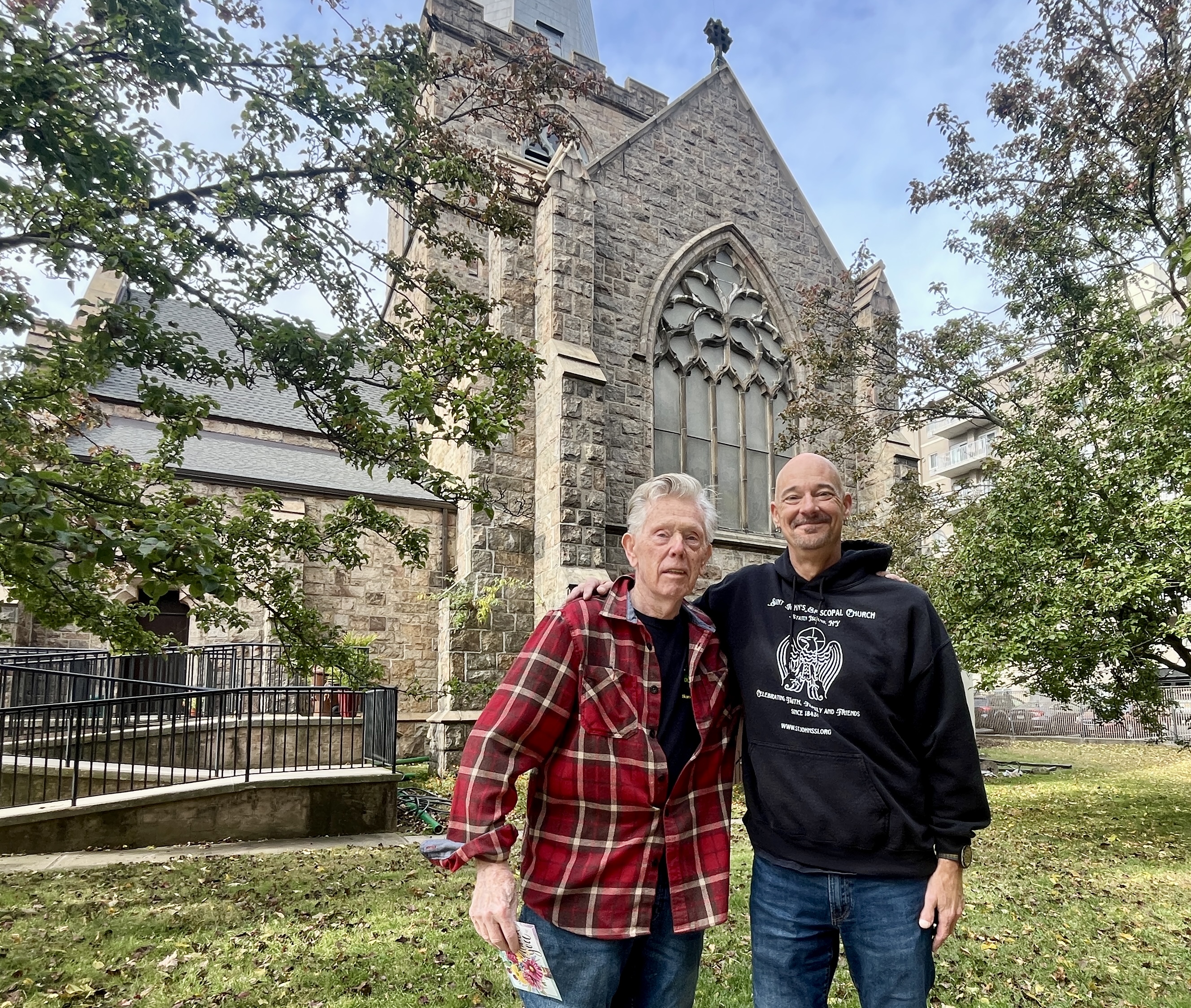 Bill O'Connor is the resident gardener at the Canterbury House in Rosebank. Here he stands with Father Hank Tuell in front of St. Johns Episcopal Church which runs the senior living apartments. (Advance/SILive.com | Jan Somma-Hammel)