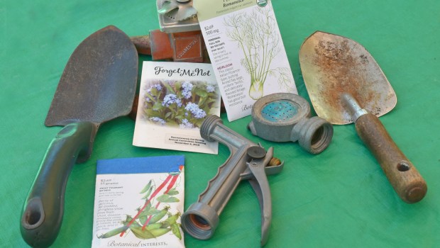 Sharing vintage tools and seed packets awakens gardening memories in memory care patients. (Frank Borkat)