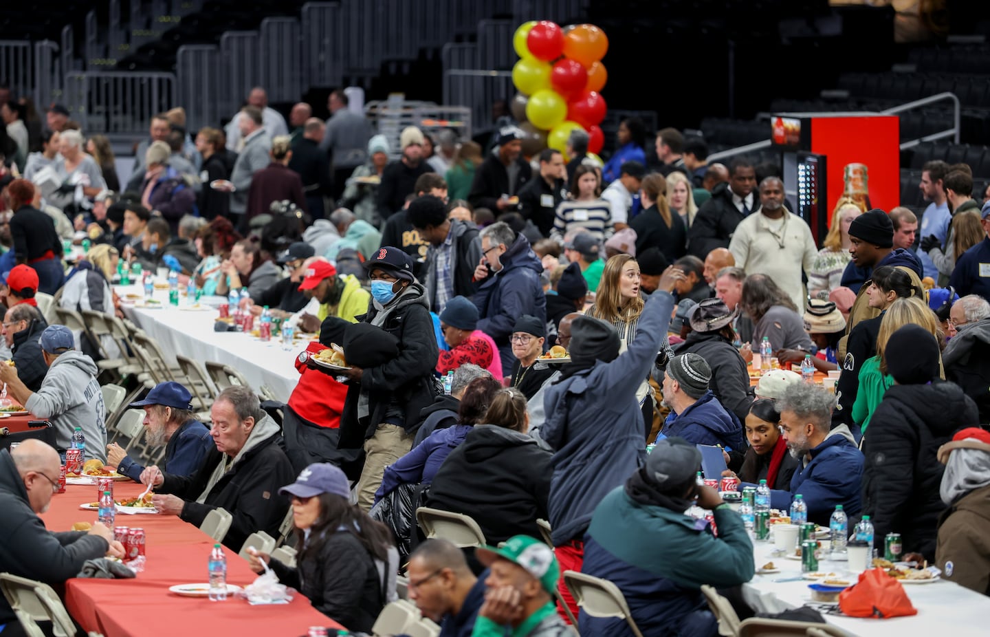 Some of the people at the annual "Table of Friends" event in partnership with Friends of Boston's Homeless for a Thanksgiving feast, held at TD Garden on Tuesday.