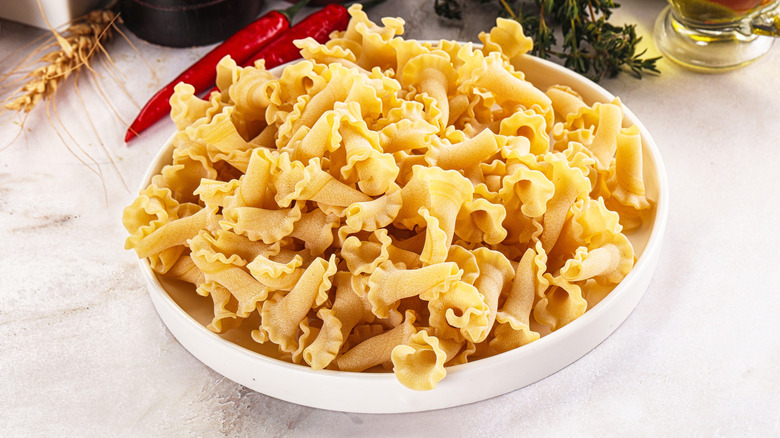 Raw gigli or campanelle noodles in a bowl