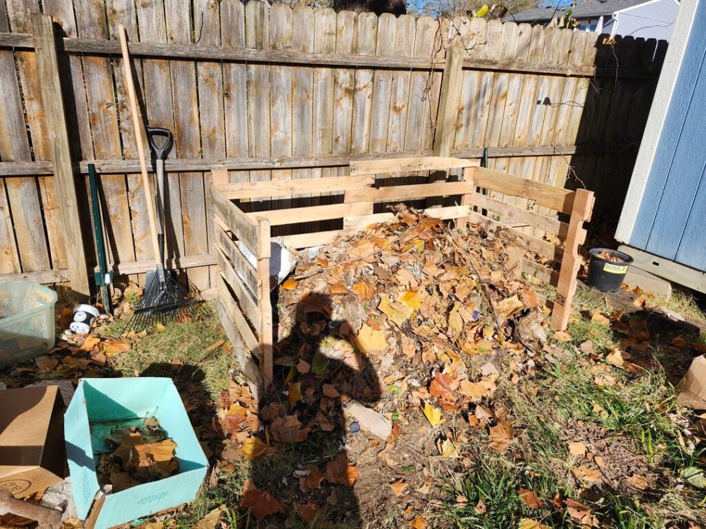 Upgraded my compost pile from chicken wire to pallet wood