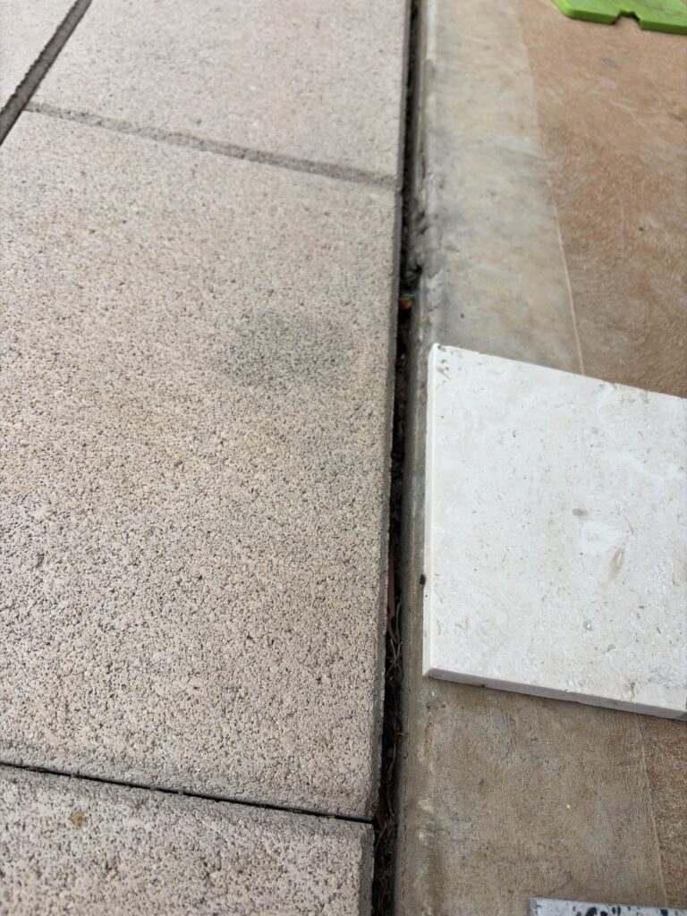 How to fix 30mm drop between outdoor tiles and pavers