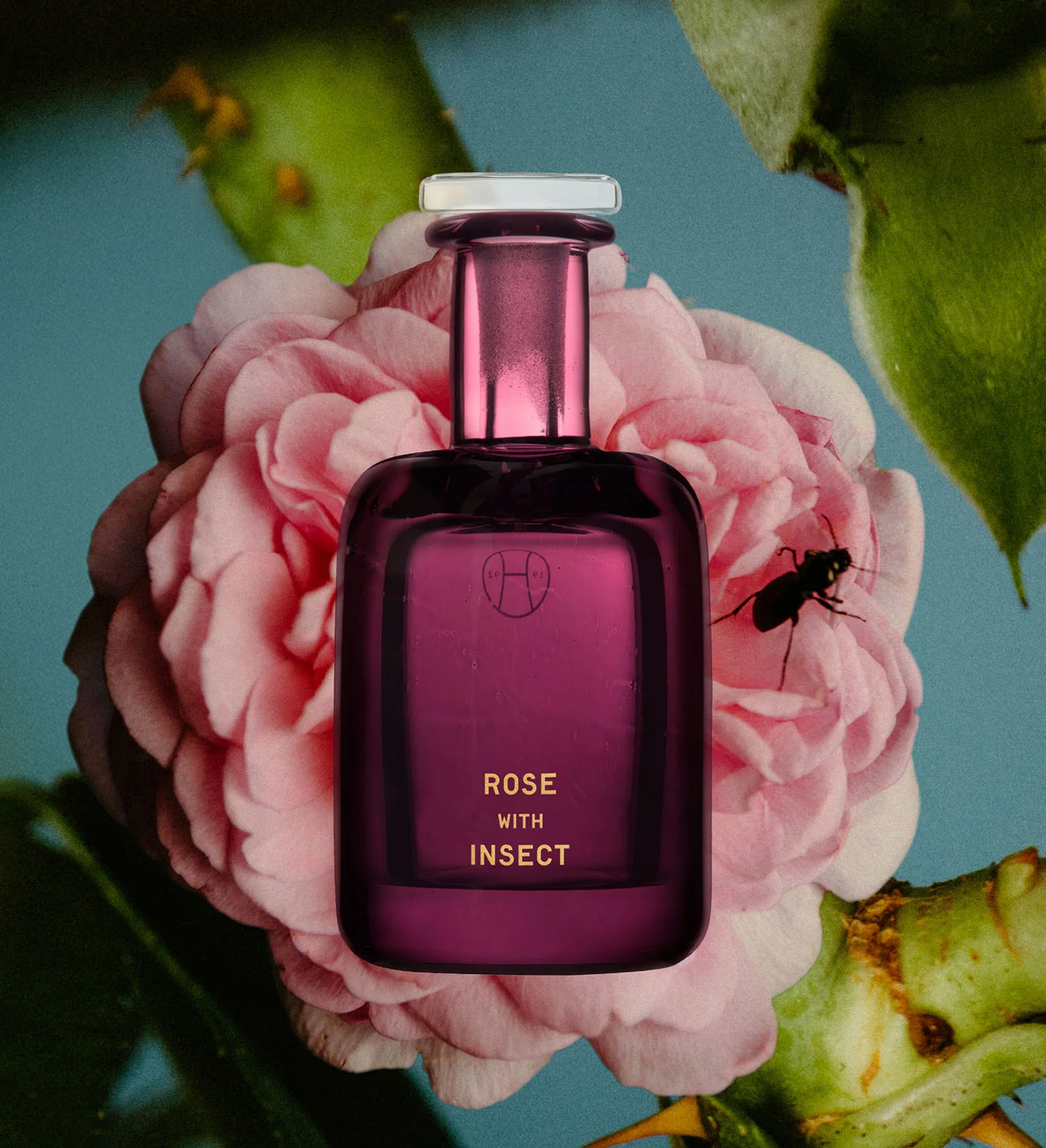Perfume H - Rose with Insects perfume bottle.