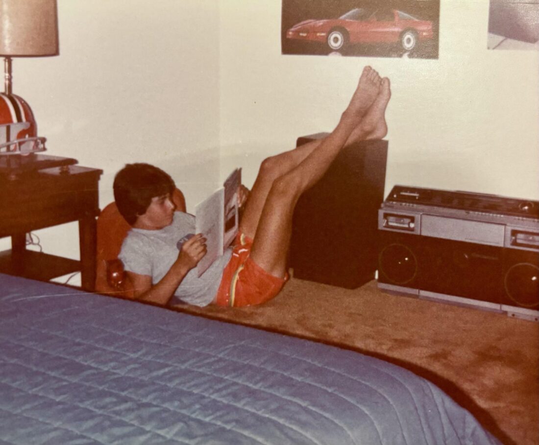 A family photo of a boy reading at home