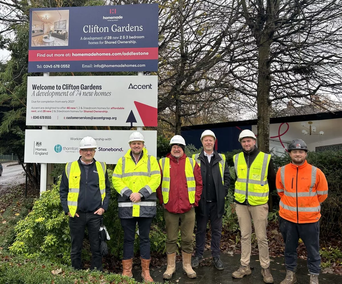 Staff at Accent Housing and their partners for the project standing outside what will be the entrance of the development