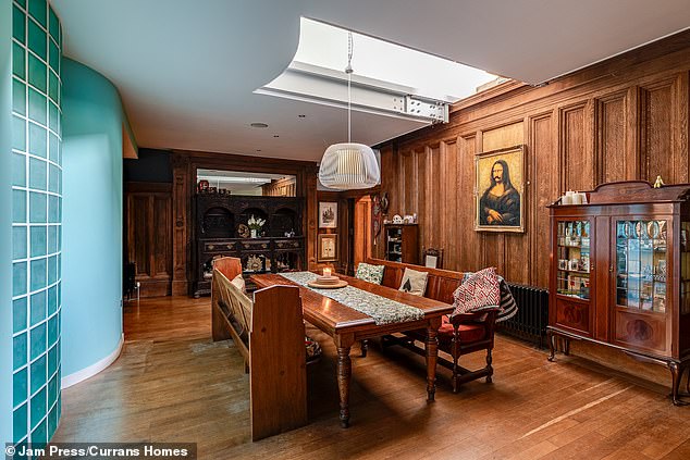 Round the back of the hall is the dining area, complete with church pews. The décor is also themed to be similar to that of a cruise ship, its listing said