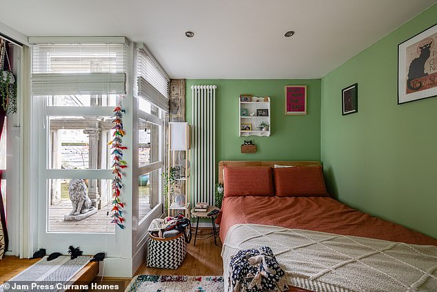 The top floor bedrooms benefit from a huge glass wall looking out onto the balcony and across the grounds