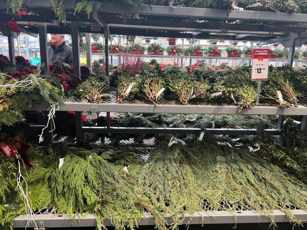 Holiday greenery is displayed at a Home Depot store in Jericho, N. Y., on Dec. 2, 2025. (Jessica Damiano via AP)