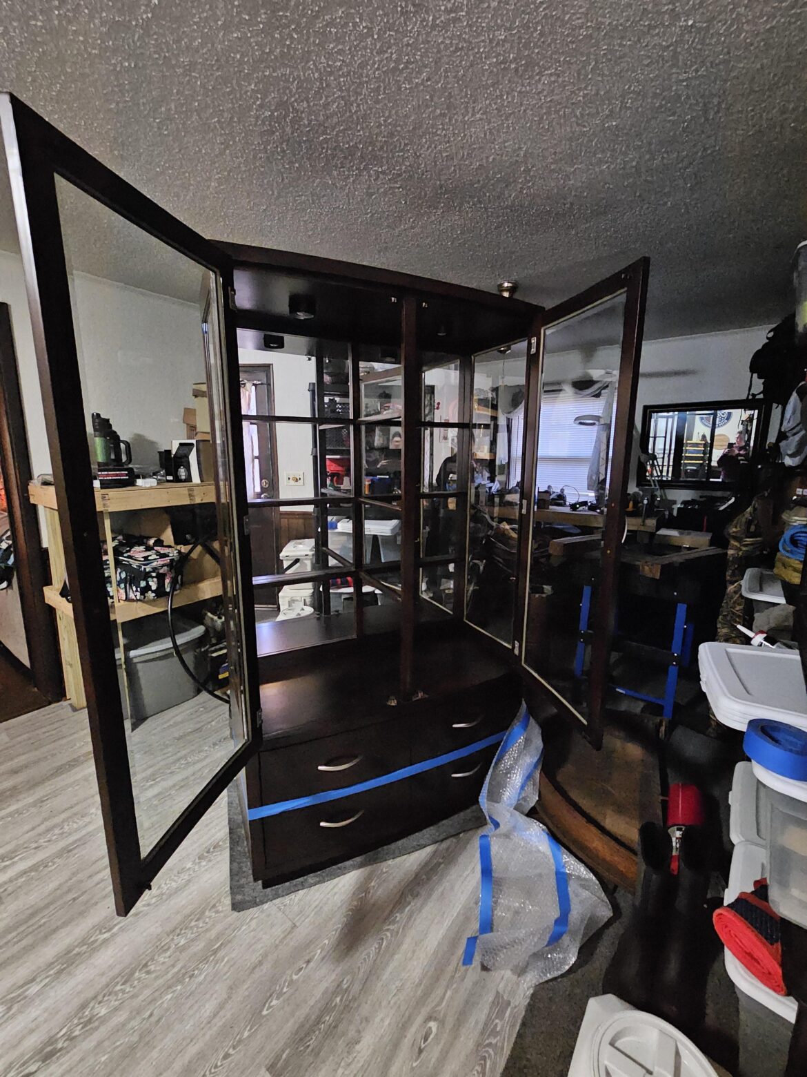 Would you leave the centerpieces and the ledges for the shelfs? Or cut it out and redo the backing