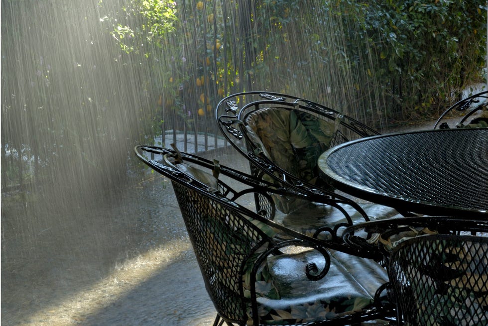 sunny day rain shower on porch