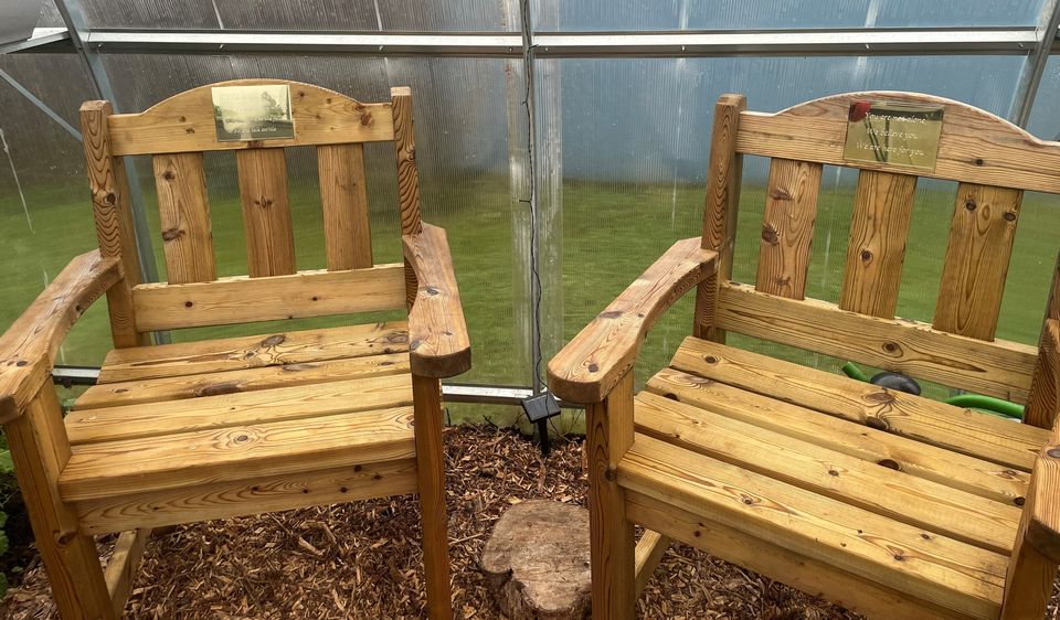 The memorial chairs in the polytunnel that were donated to Safe Ireland Mayo.