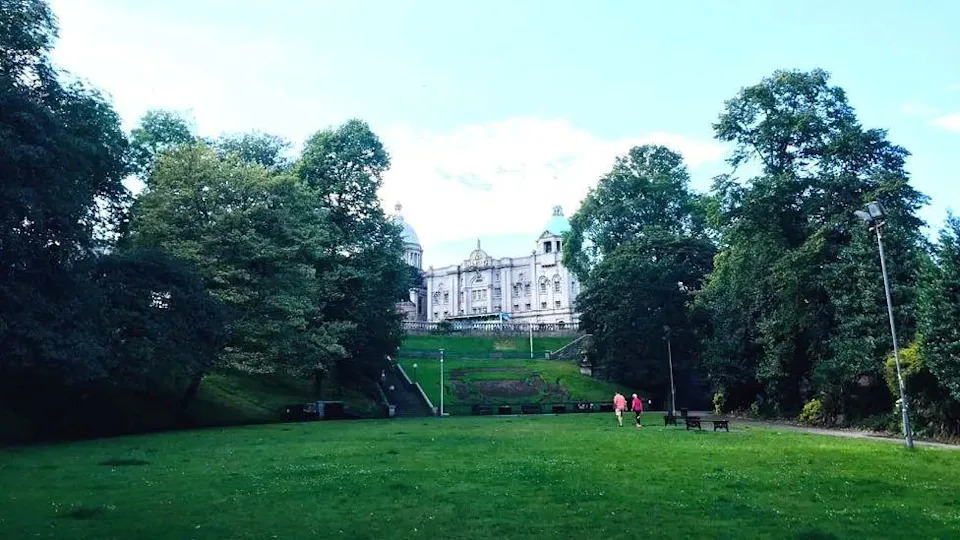 A previous image of Union Terrace Gardens in Aberdeen, people walking across the grass in the middle.