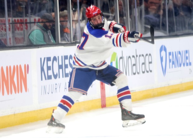 Tewksbury High's Jackson Feudo makes a pass to a teammate during a hockey game at the TD Garden in Boston, home of the Boston Bruins. (Courtesy photo)