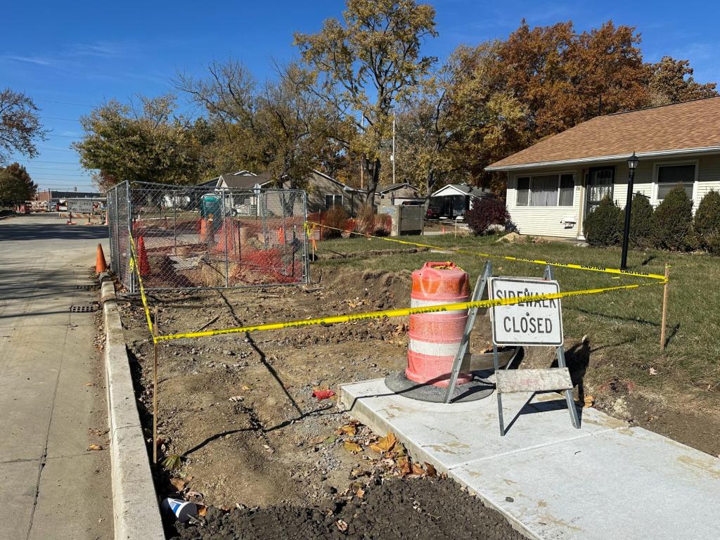 A sidewalk was removed on corner of Paula Drive and Cynthia Drive in Garden Hills. Photo by Mazie Gierat 