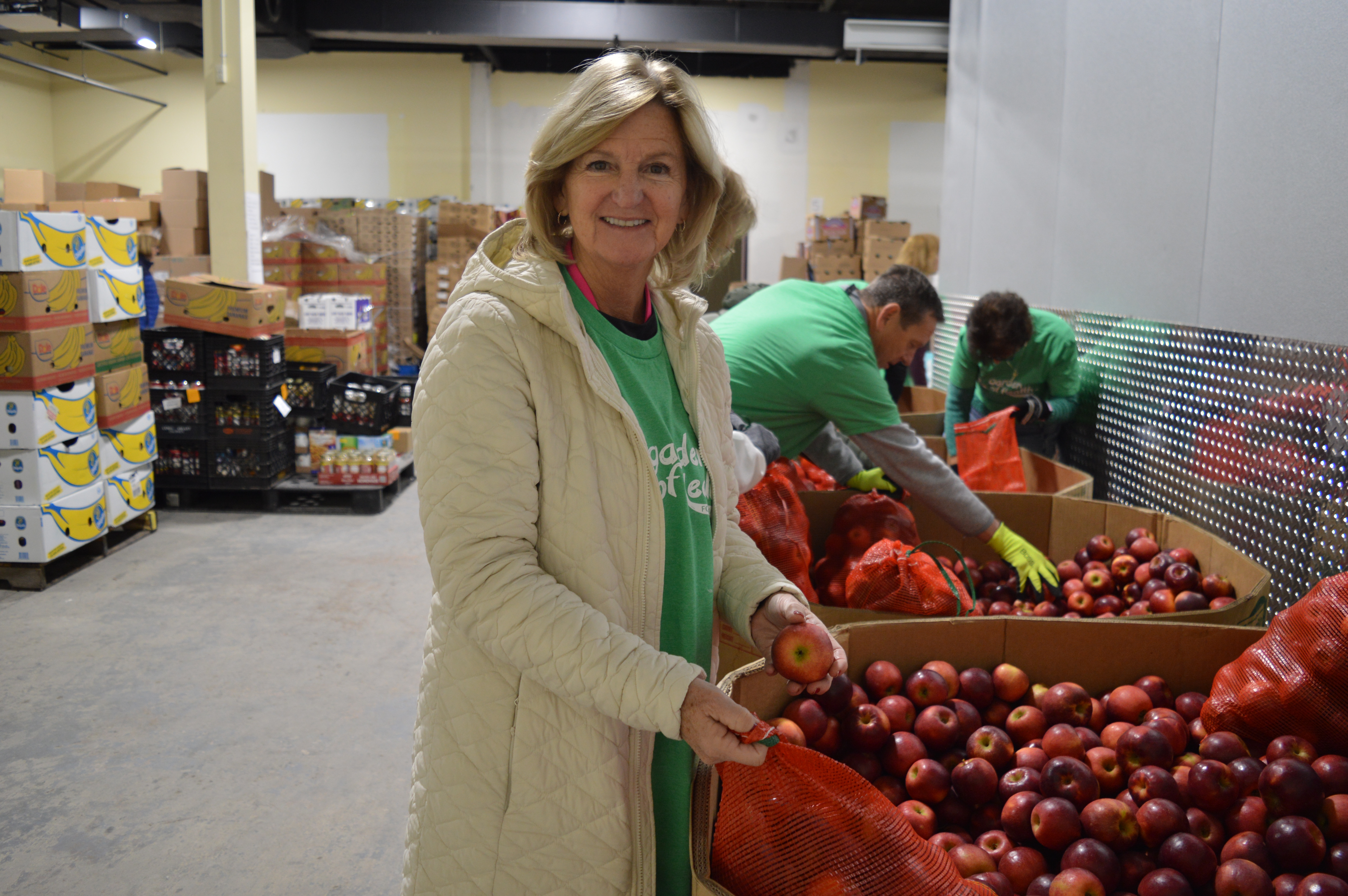 Maryann Brophy, a volunteer at Garden of Health Food Bank...