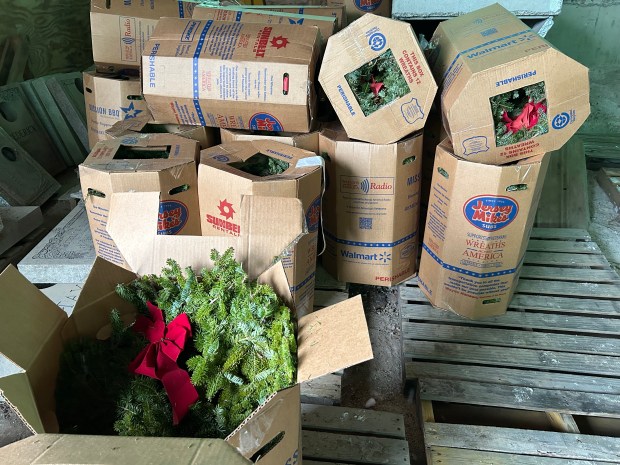 Fifty-four boxes of wreaths, each containing 12 wreaths, were delivered to Resthaven Memory Gardens as part of the Wreaths Across America program. (Larissa Beriswill - The Morning Journal)