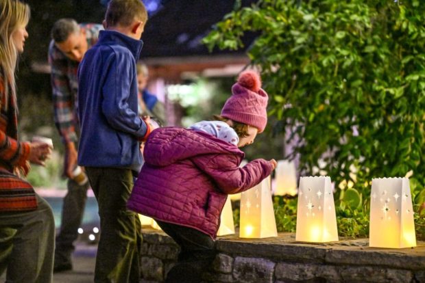 Family moments under the glow of a luminaries. The Sonoma Botanical Gardens will host the Gardens Aglow event, which runs Fridays, Saturdays, and Sundays from Dec. 5-21, with timed, ticketed entry at 5 p.m. and 6:30 p.m. (Photo by Daniel Perales/ Courtesy of the Sonoma Botanical Garden.)