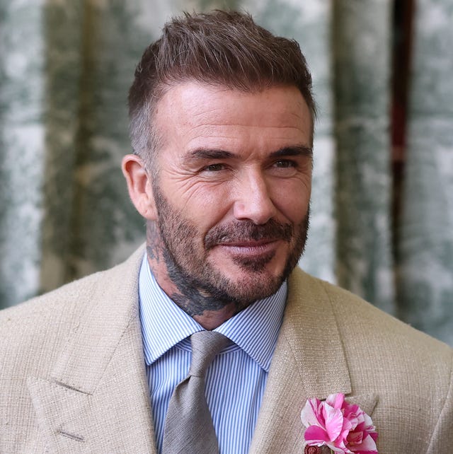 london, england may 20: david beckham wearing a david austin roses kings rose waits to speak to the king during a visit to the rhs chelsea flower show at royal hospital chelsea on may 20, 2025 in london, england. (photo by toby melville wpa pool / getty images)