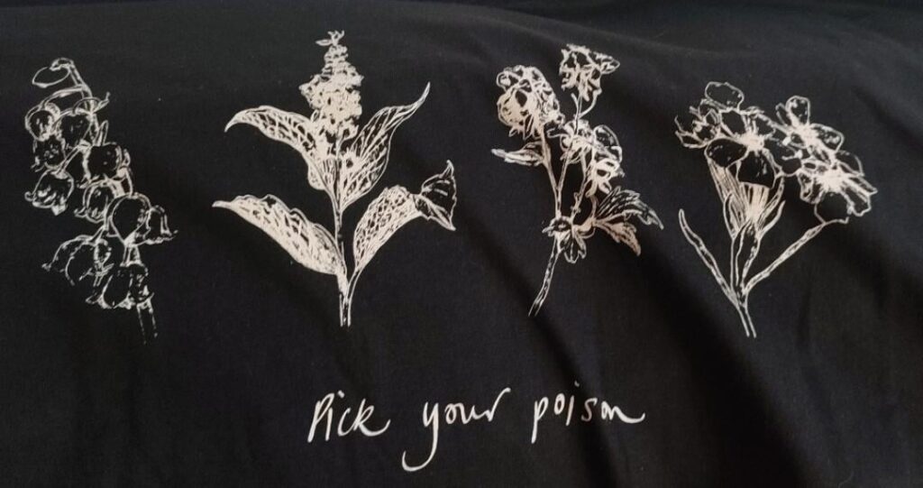 What are the poisonous plants depicted on this shirt?