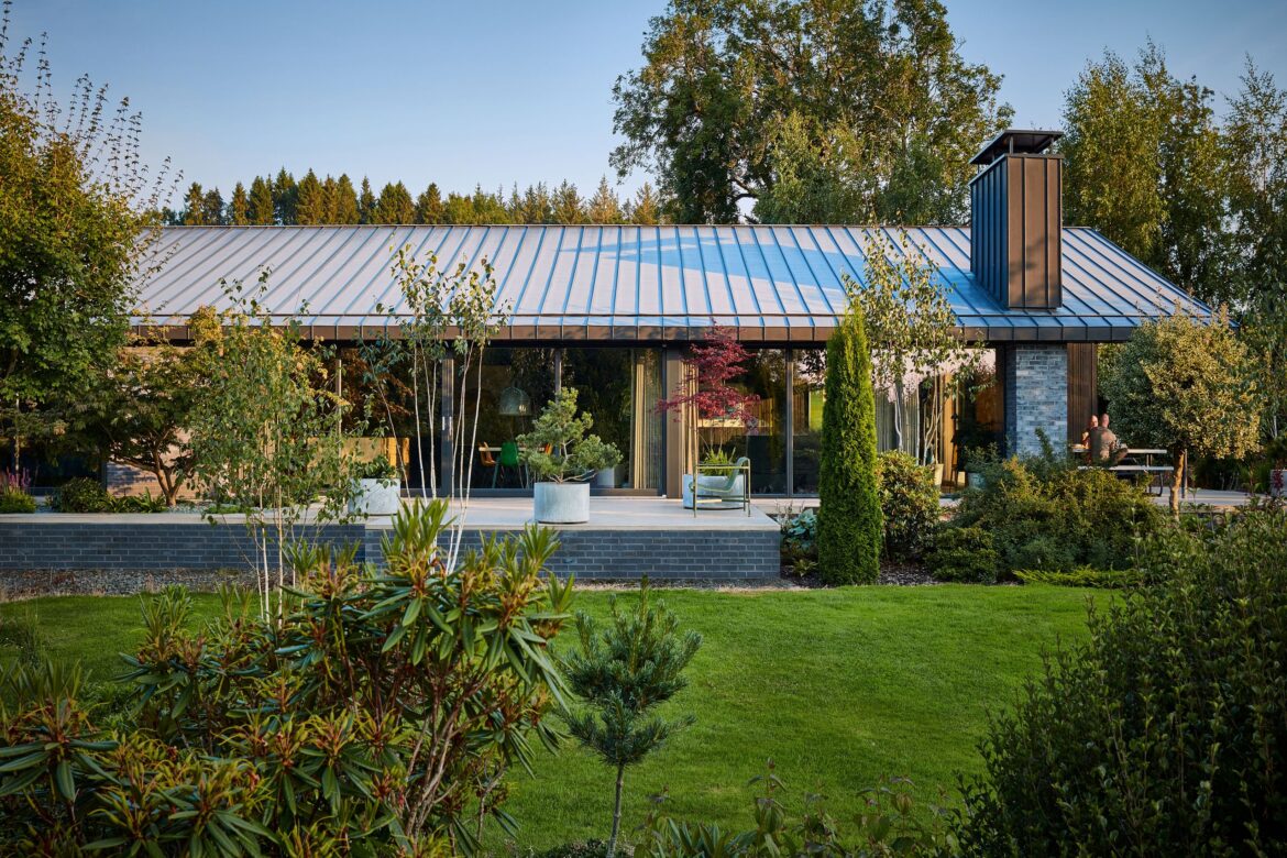 A compact Scottish home nestles into its garden setting