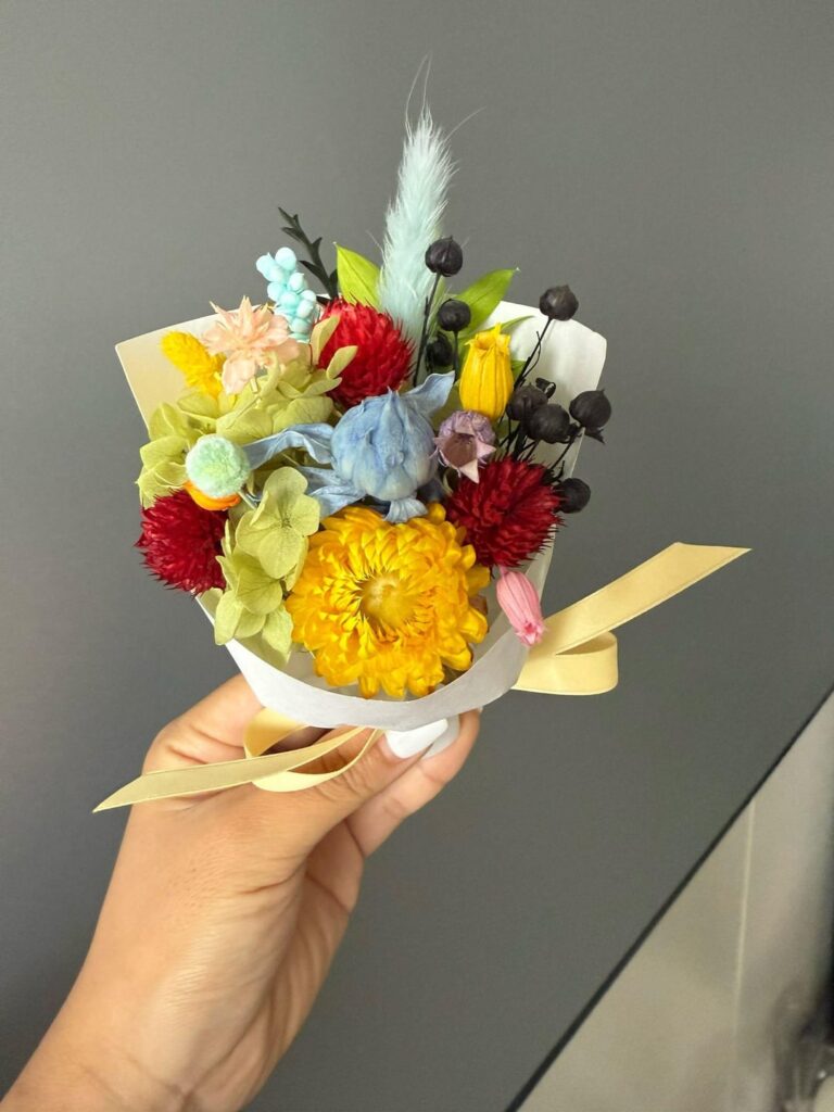 My friend started making these adorable 'pocket bouquets' with preserved flowers