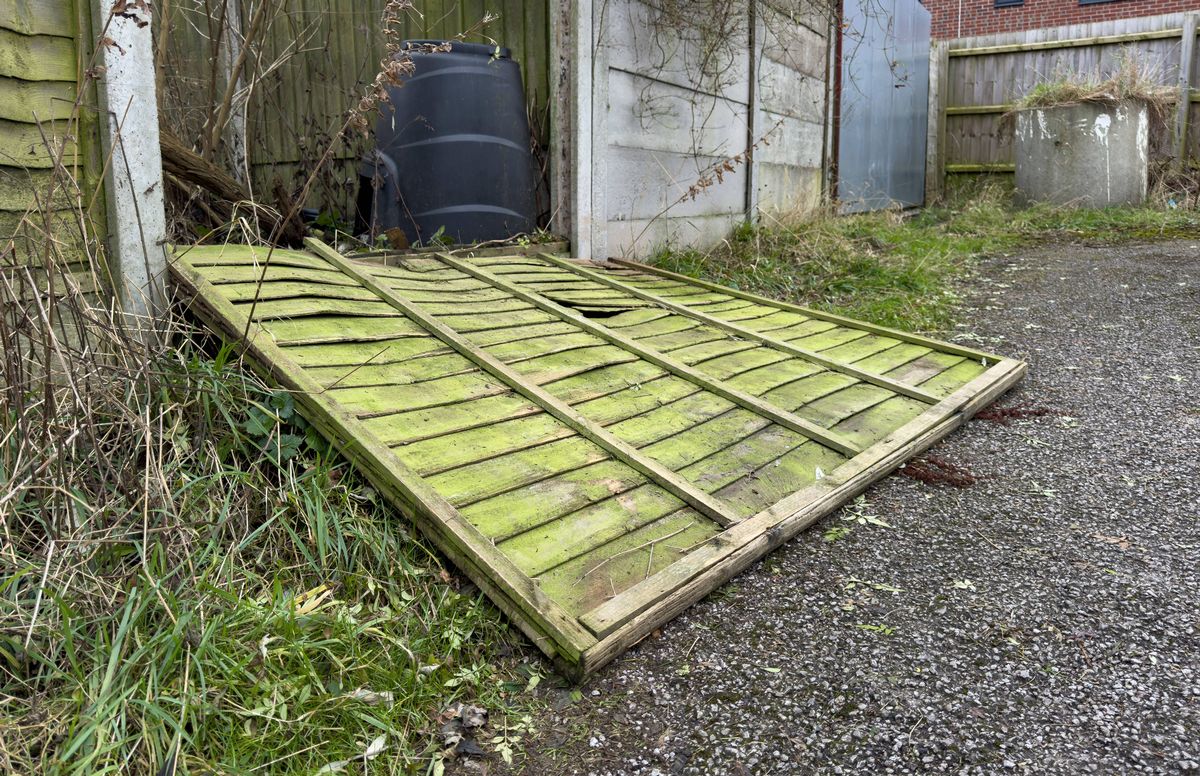 Storm damage to a garden fence, high winds